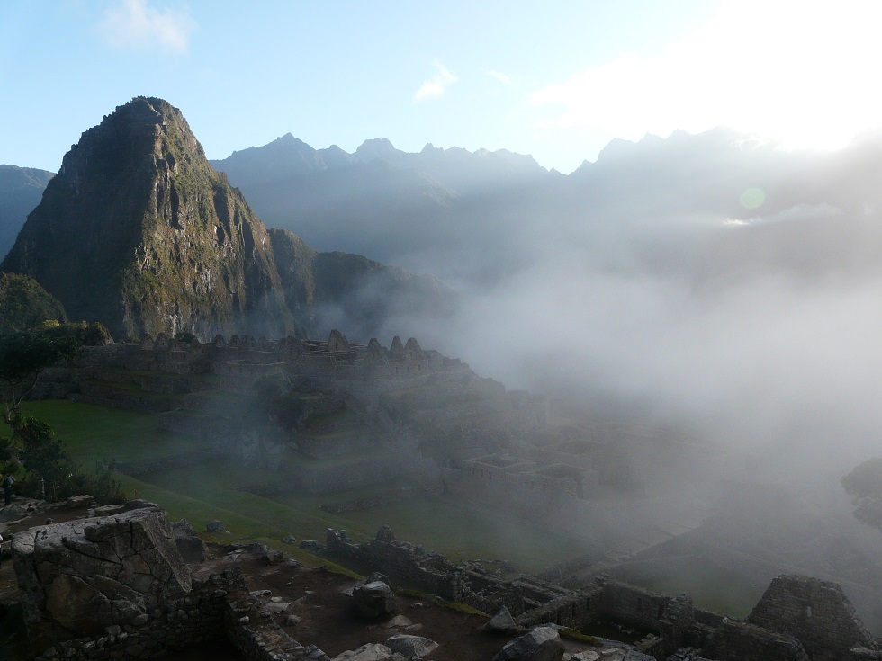 How to get from Lima to Machu Picchu: a view of the Machu Picchu covered by clouds