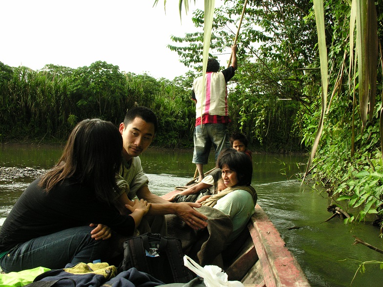 Boat with people at a river in Manu.