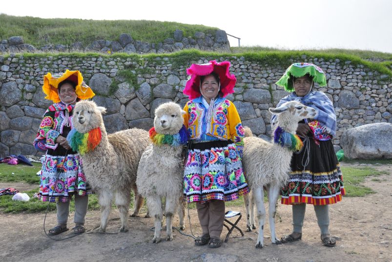 Tipping in Peru: Make sure to leave a tip  to the women that are dressed in their traditional clothing with their llamas.