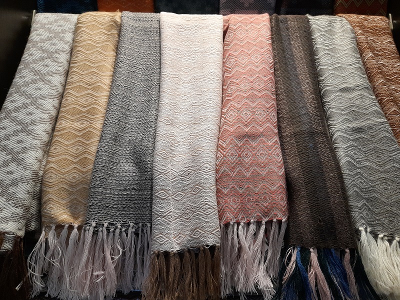 Alpaca shawls in greay and brown hues