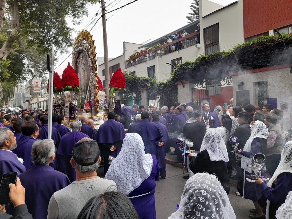 Procession in purple for Señor de los Milagros, a unique cultural event in October, highlighting Lima's rich traditions and community spirit.