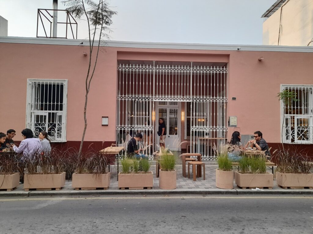 people eating and drinking at Domeyer street in Barranco