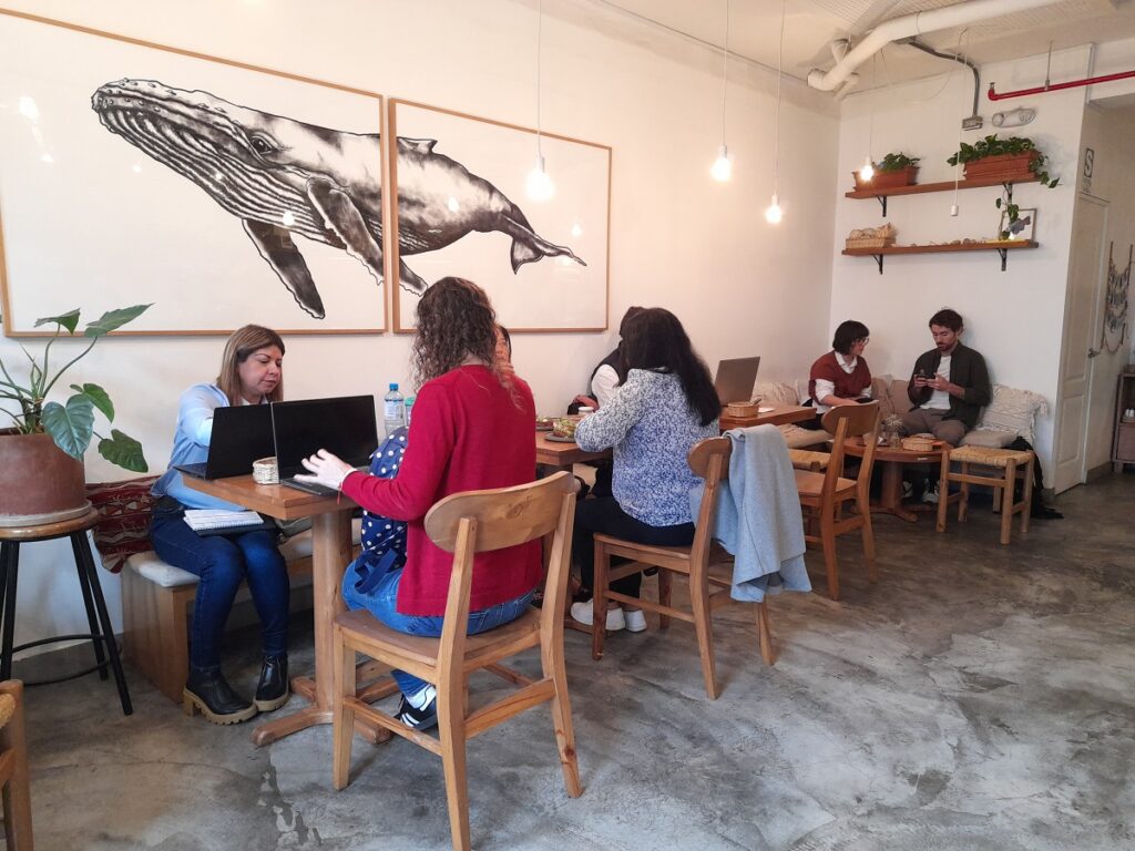 Digital nomads working in a coffee shop in Barranco