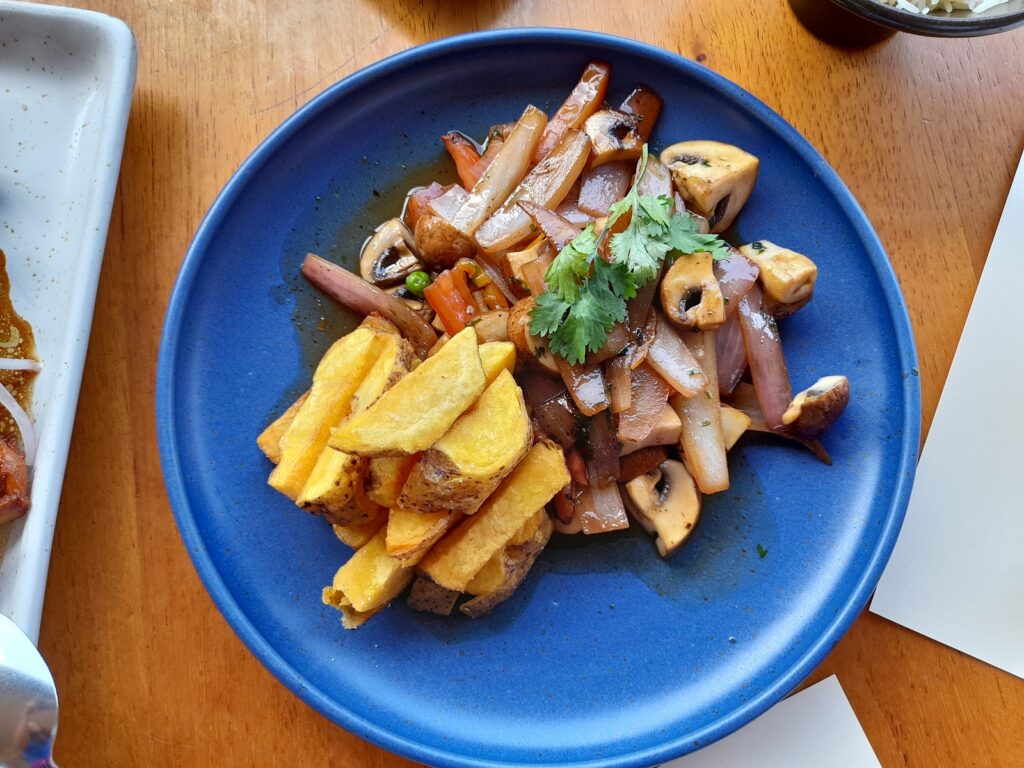 A typical dish of Lima: lomo saltado. This version is made with mushrooms. This dish is one of the highlights of the recommeded food tour for your Lima itinerary.